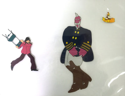 Original Beatles Production Cels From Yellow Submarine featuring George and Captain Fred