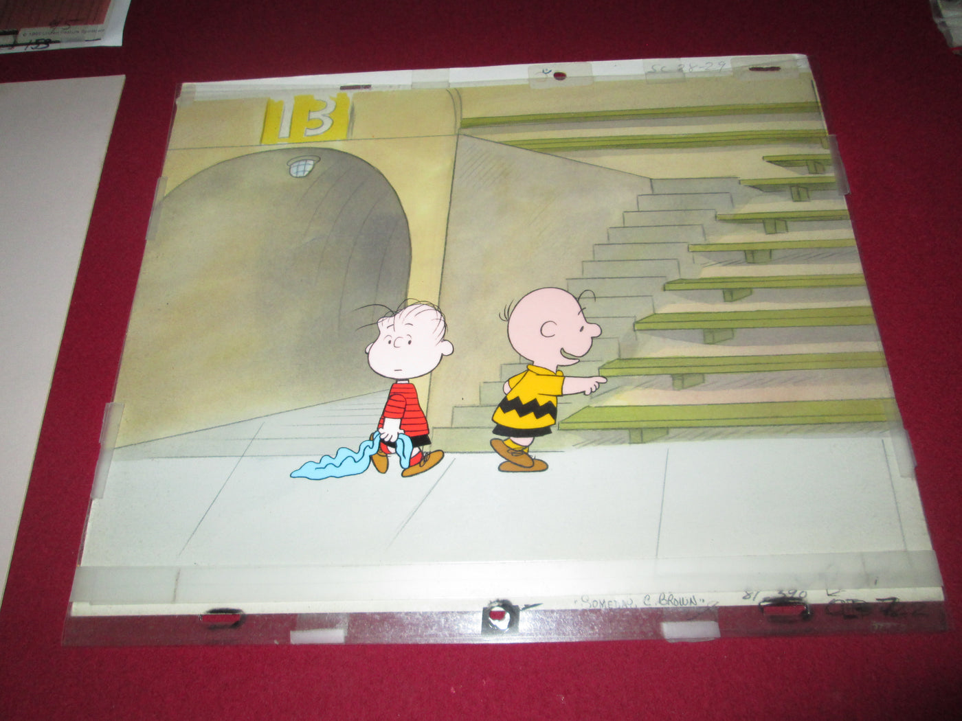 Original Peanuts Production Cel on Production Background featuring Linus and Charlie Brown from Someday You'll Find Her, Charlie Brown (1981)