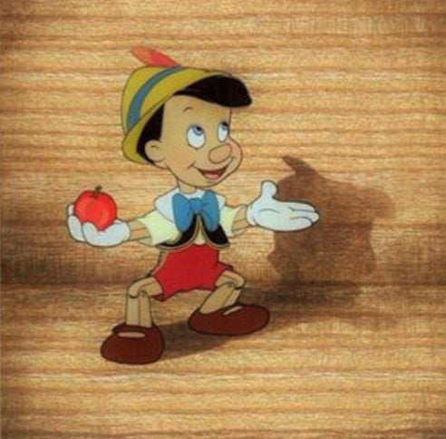 Original Walt Disney Production Cel of Pinocchio from Pinocchio on a Courvoisier Background
