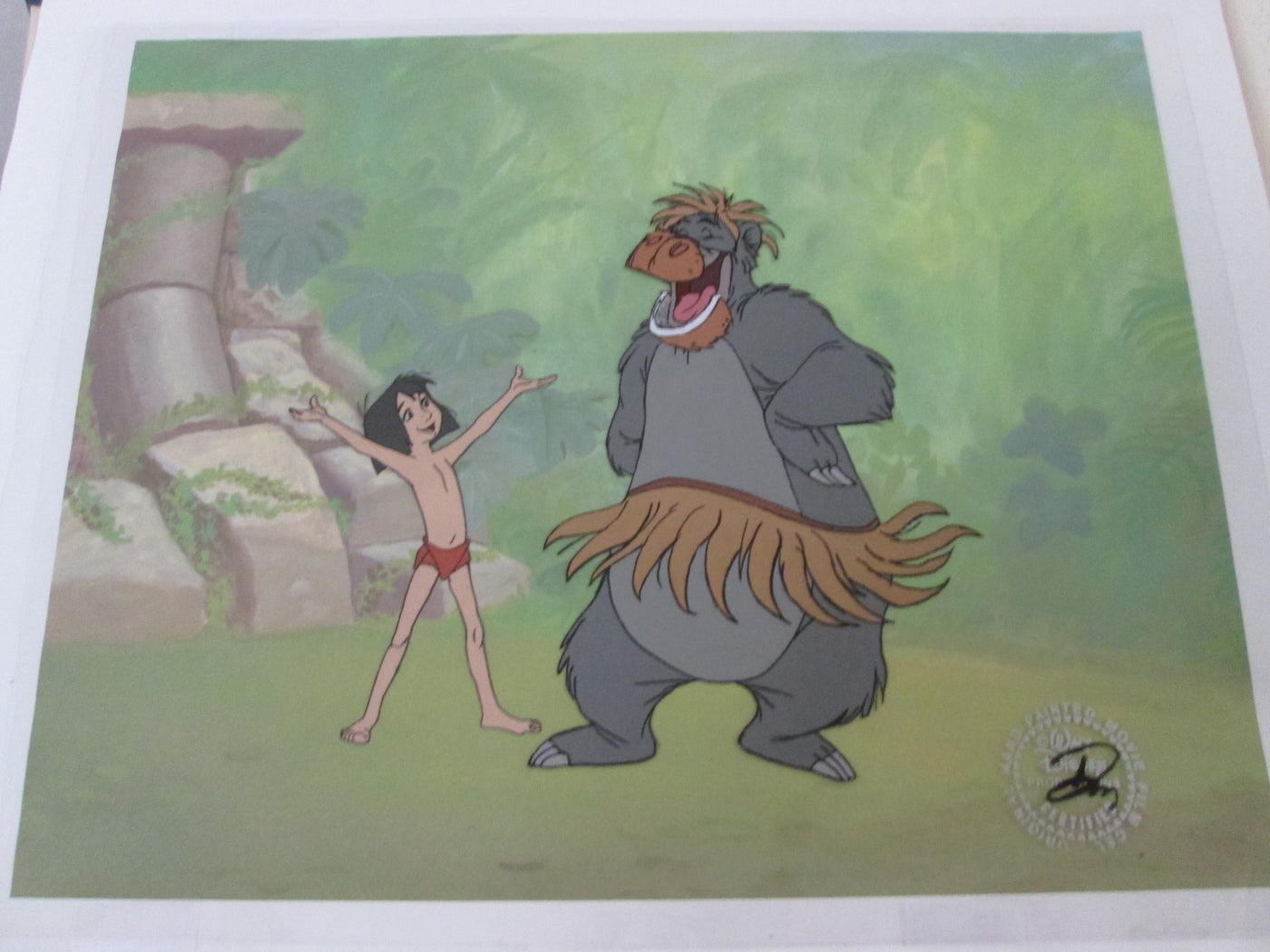 Original Walt Disney Production Cel from The Jungle Book featuring Mowgli and Baloo