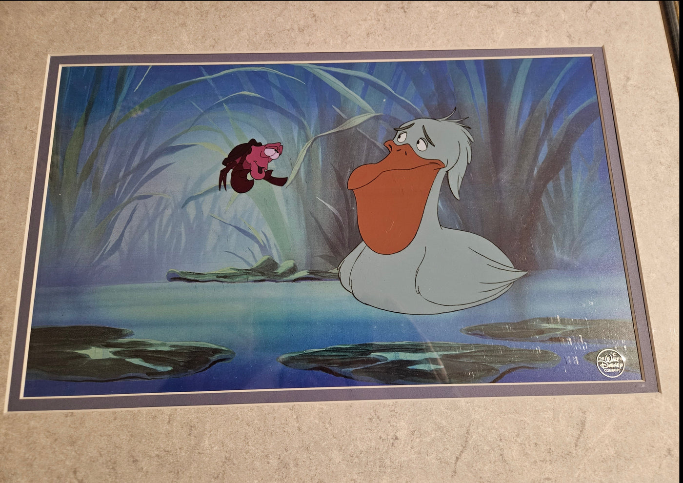 Original Walt Disney Production Cel from The Little Mermaid featuring Sebastian and a pelican