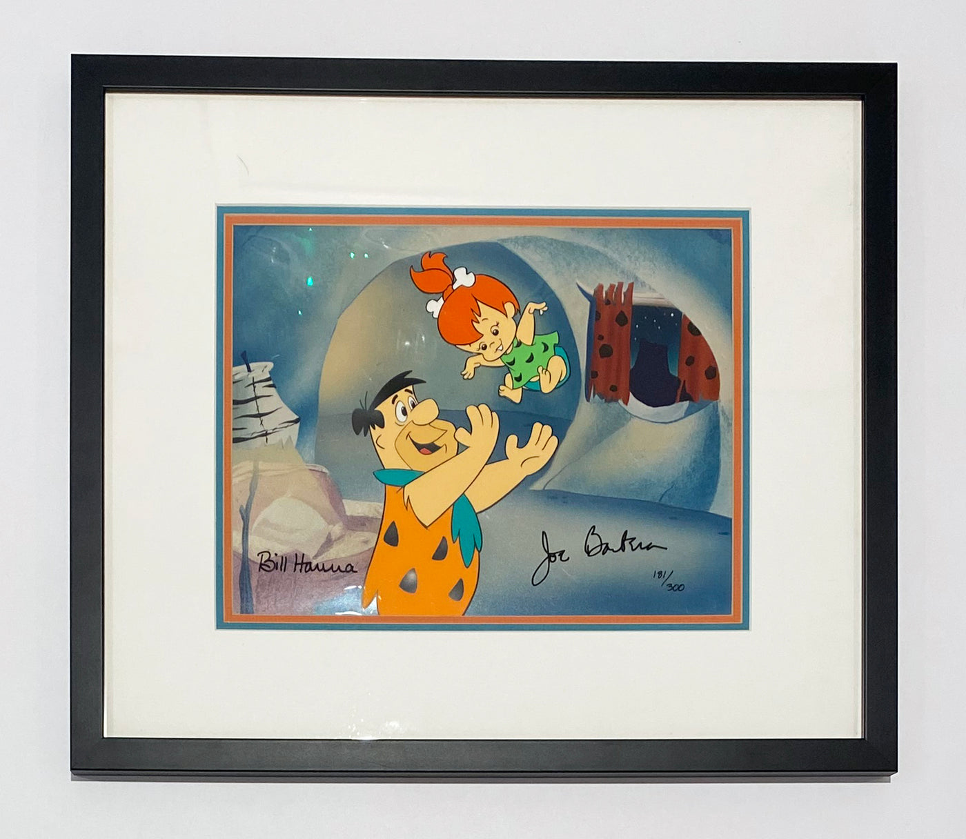 Original Hanna Barbera Limited Edition Cel "Tossing Pebbles" featuring Fred Flintstone and Pebbles, Signed by Bill Hanna and Joe Barbera