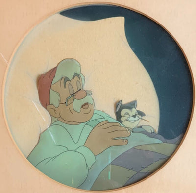 Original Walt Disney Production Cel on Courvoisier Background from Pinocchio featuring Geppetto and Figaro