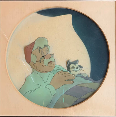 Original Walt Disney Production Cel on Courvoisier Background from Pinocchio featuring Geppetto and Figaro