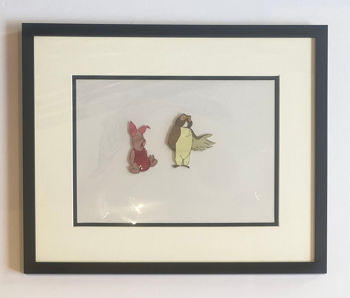 Original Walt Disney Production Cels from The Many Adventures of Winnie the Pooh featuring Piglet and Owl