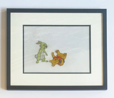 Original Walt Disney Production Cels from The Many Adventures of Winnie the Pooh featuring Winnie the Pooh and Rabbit
