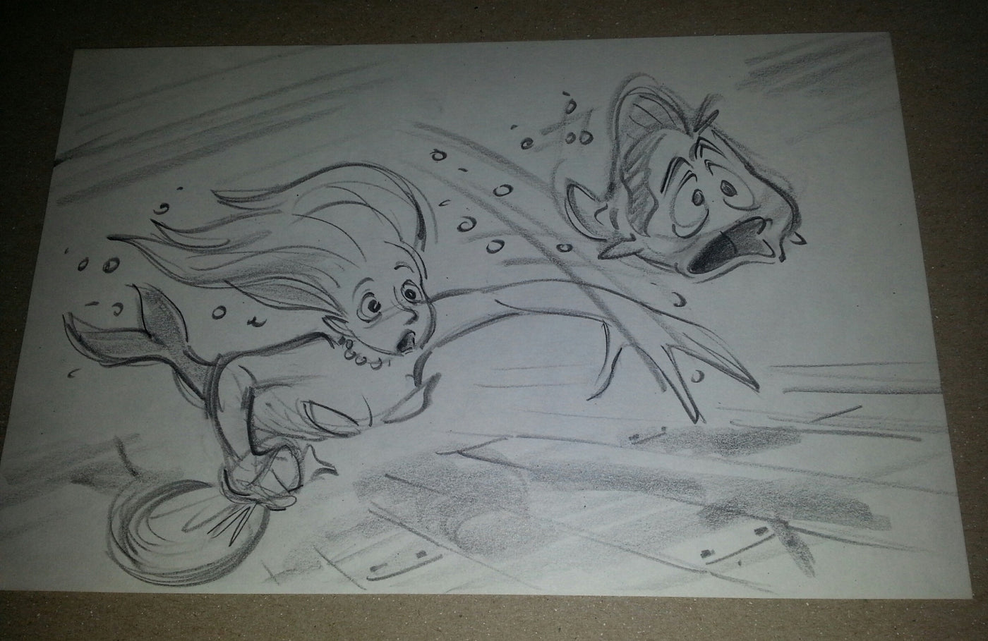 Original Walt Disney Storyboard Drawing From The Little Mermaid featuring Ariel and Flounder