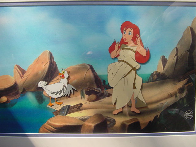 Original Walt Disney Two Production Cel Set-up on Color Photographic background featuring Ariel and Scuttle