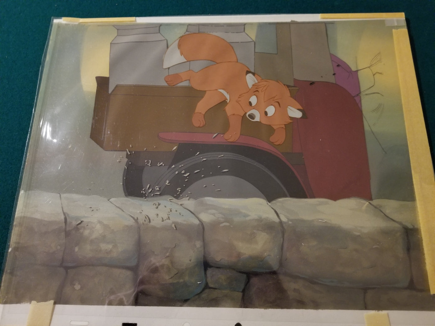 Original Walt Disney Production Cel on Hand Painted Preliminary Background from The Fox and the Hound featuring Tod