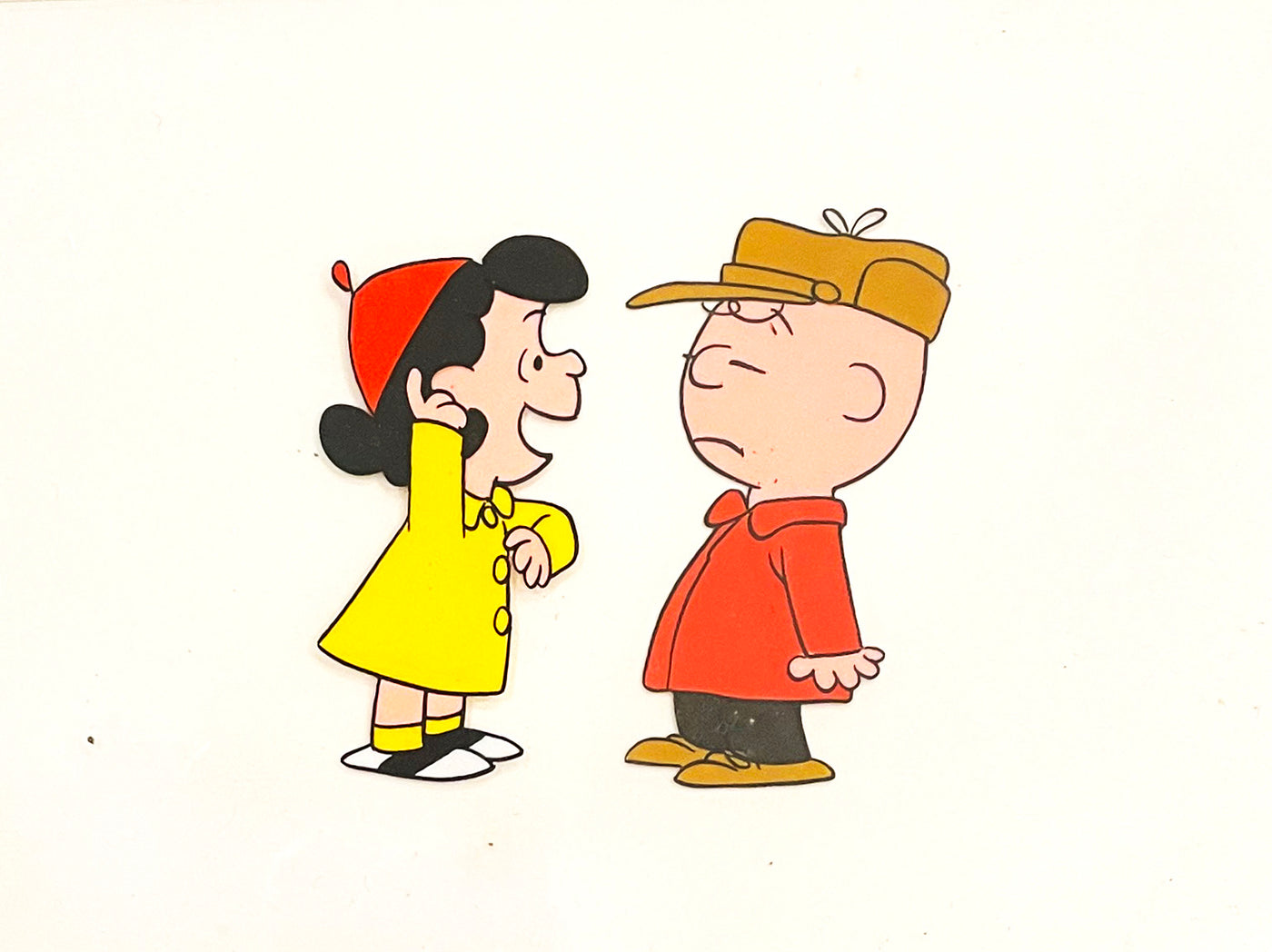 Original Peanuts Production Cel featuring Charlie Brown and Lucy van Pelt