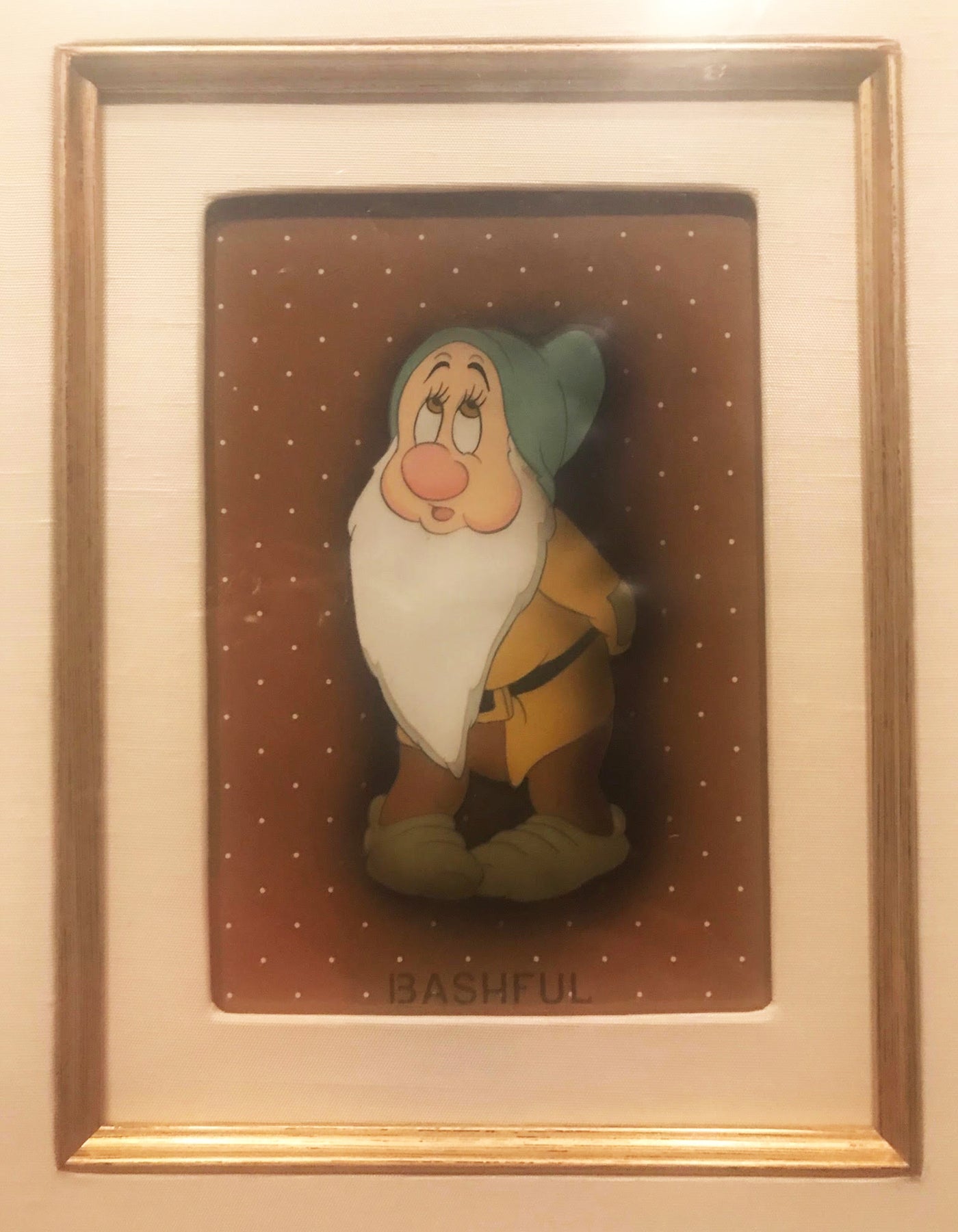 Original Walt Disney Production Cel on Courvoisier Background from Snow White and the Seven Dwarfs featuring Bashful