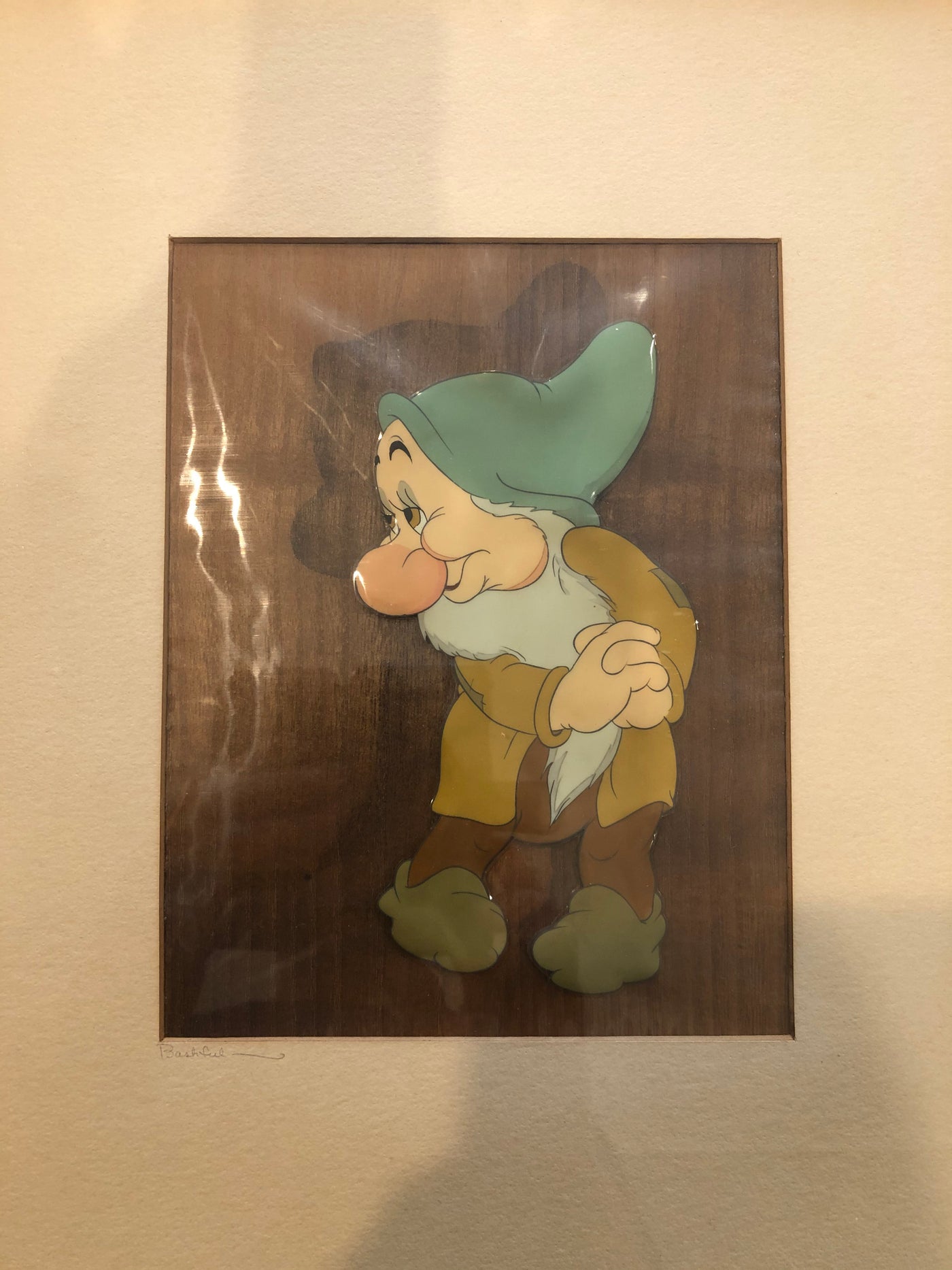 Original Walt Disney Production Cel on Courvoisier Background of Bashful from Snow White and the Seven Dwarfs