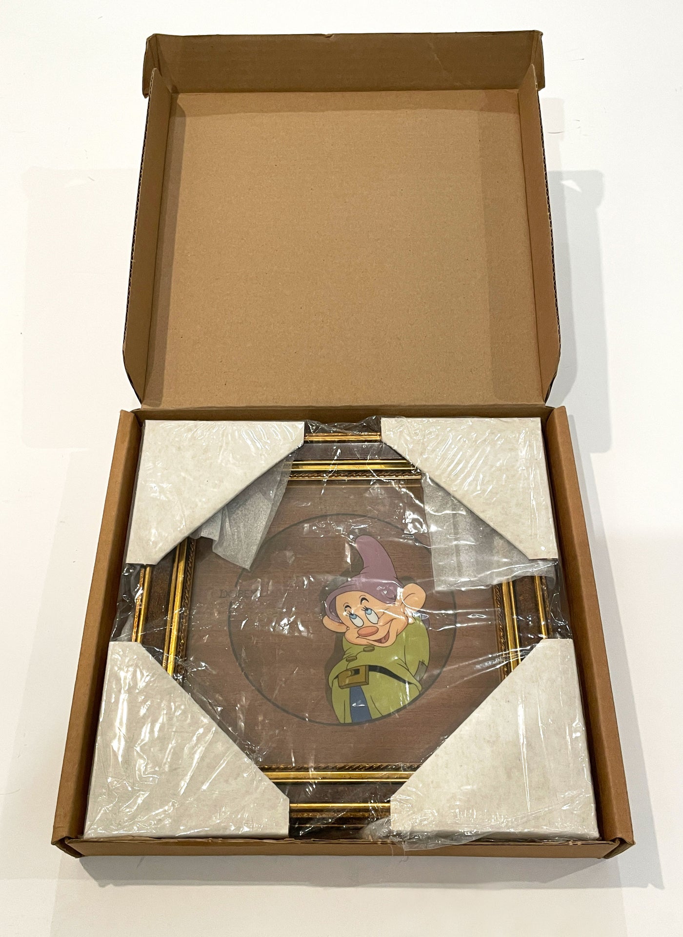 Original Walt Disney Limited Edition Courvoisier Cel from Snow White and the Seven Dwarfs, featuring Dopey