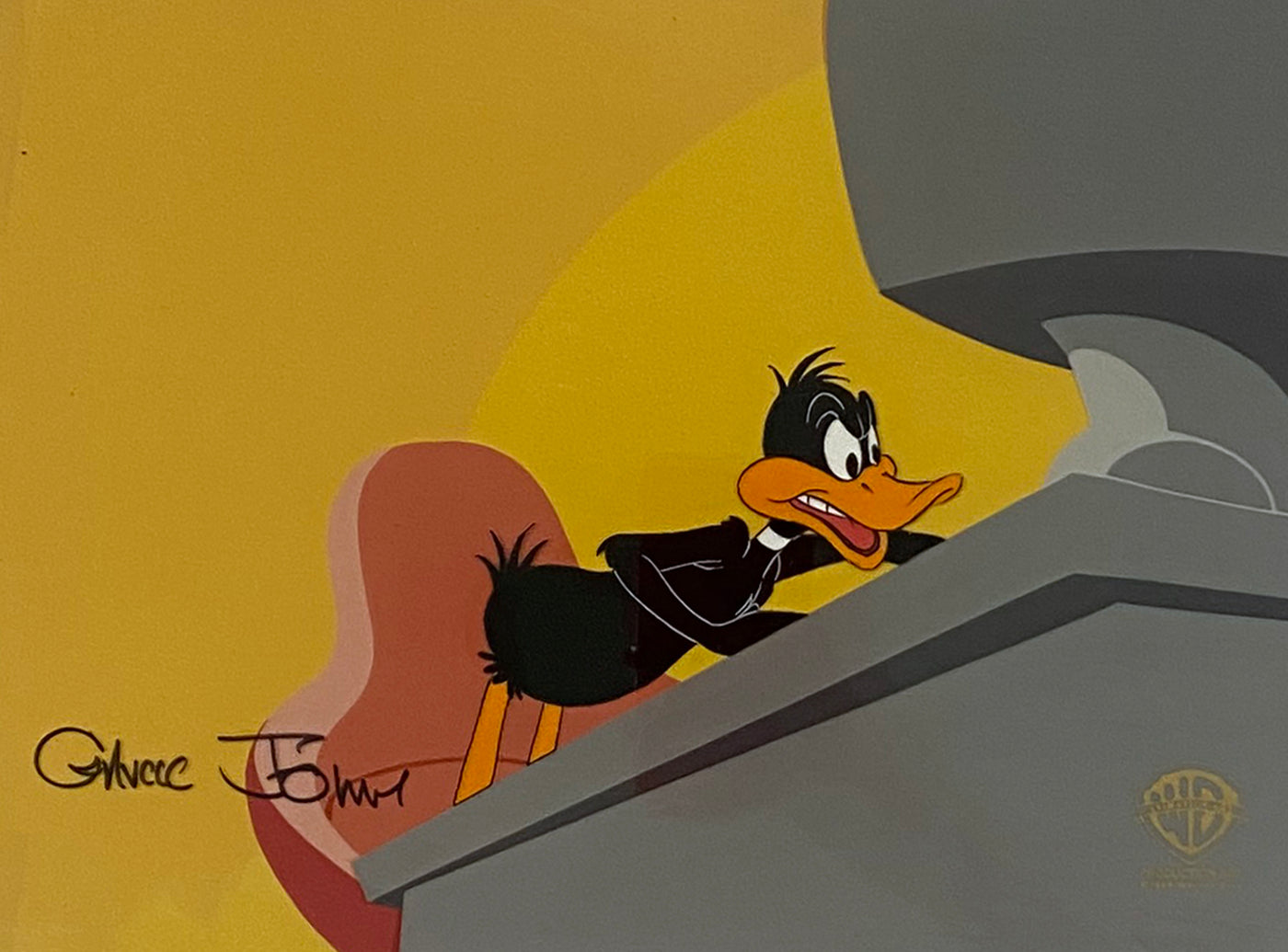 Original Warner Brothers Production Cel from "Gremlins 2" main title sequence featuring Daffy Duck, Signed by Chuck Jones