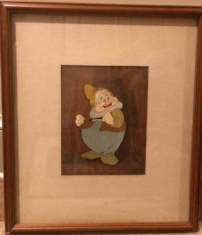 Original Walt Disney Production Cel on Courvoisier Background of Happy from Snow White and the Seven Dwarfs
