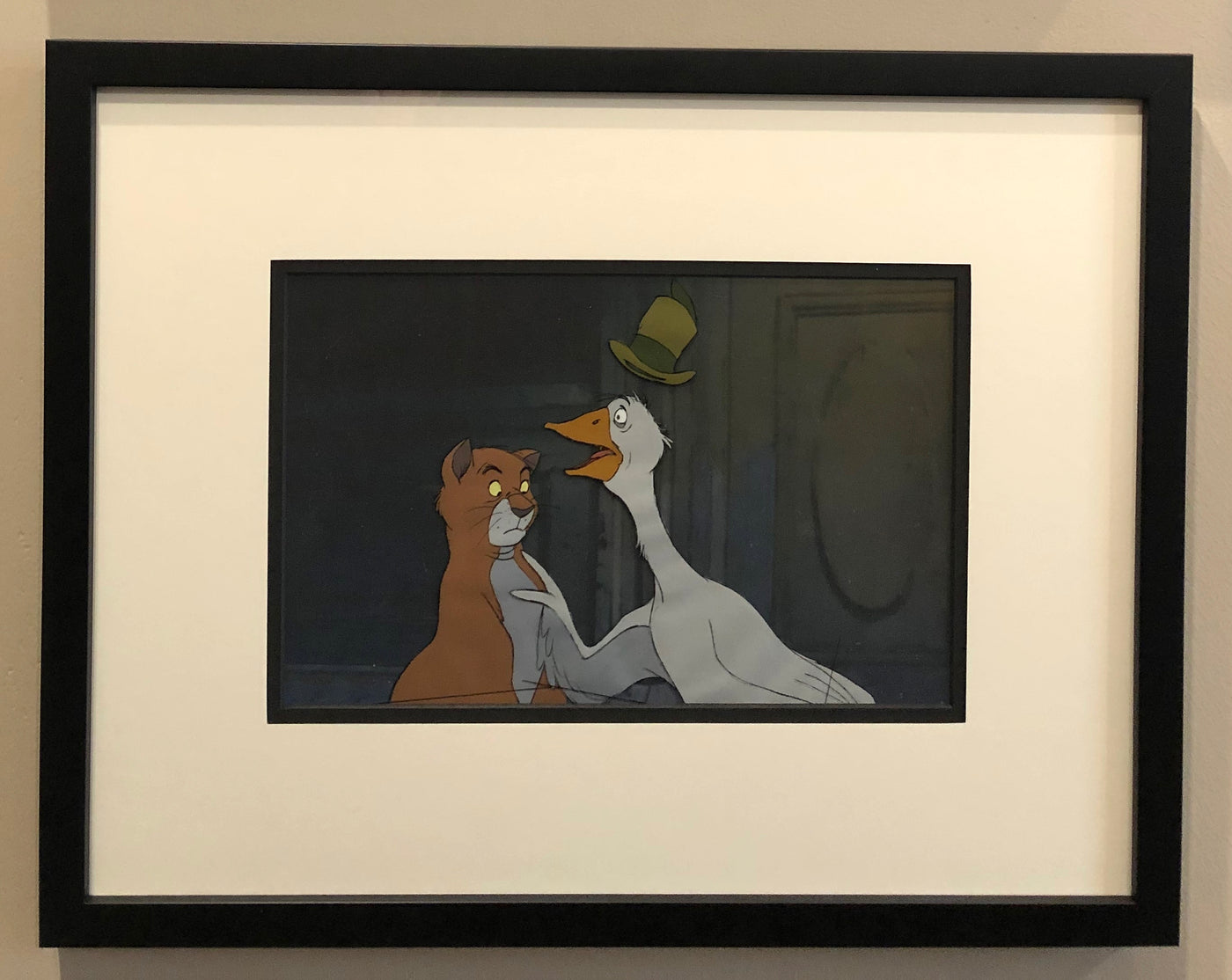 Original Walt Disney Production Cel from The Aristocats featuring Thomas O'Malley and Uncle Waldo