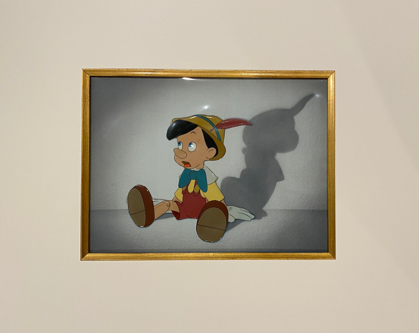Original Walt Disney Production Cel of Pinocchio on a Courvoisier Background from Pinocchio (1940)