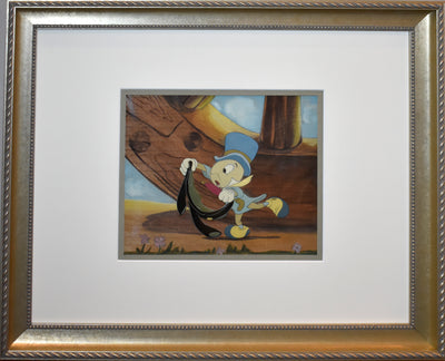 Original Walt Disney Production Cel on Courvoisier Background from Pinocchio featuring Jiminy Cricket
