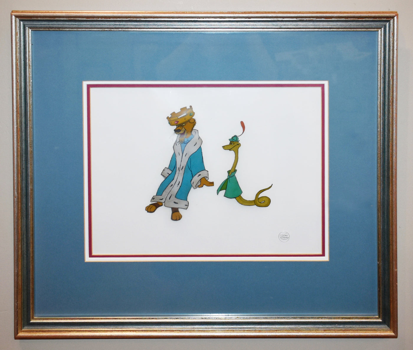 Original Disney Production Cel from Robin Hood featuring Prince John and Sir Hiss