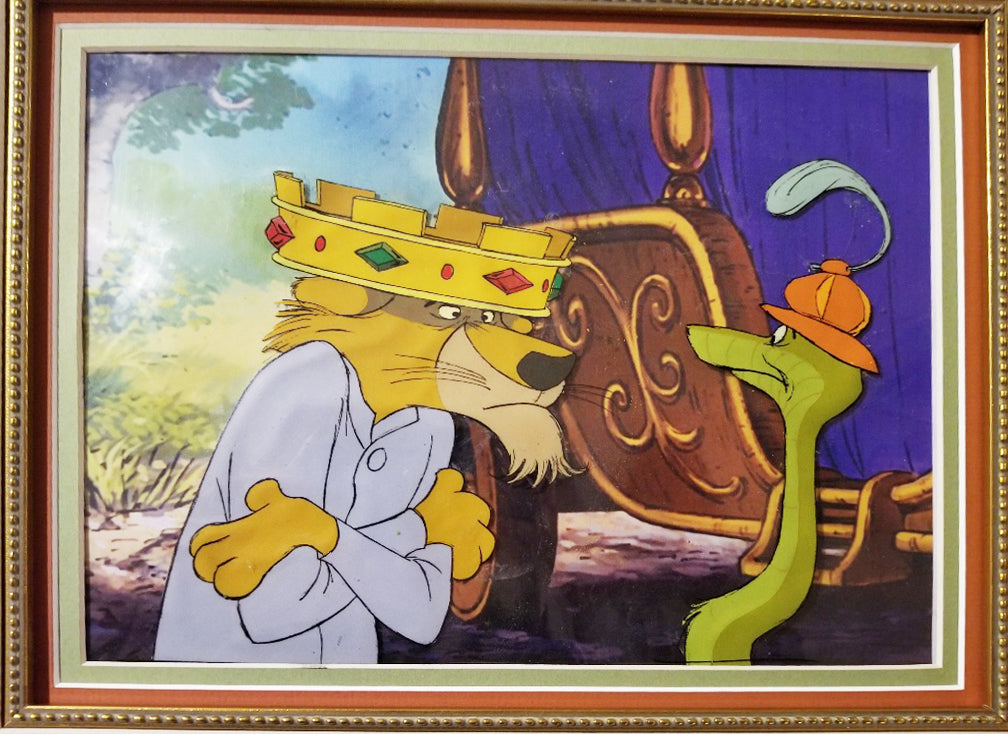 Original Disney Production Cel from Robin Hood featuring Prince John and Sir Hiss