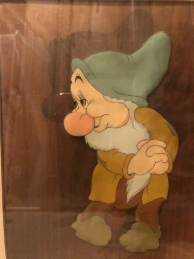 Original Walt Disney Production Cel on Courvoisier Background of Bashful from Snow White and the Seven Dwarfs