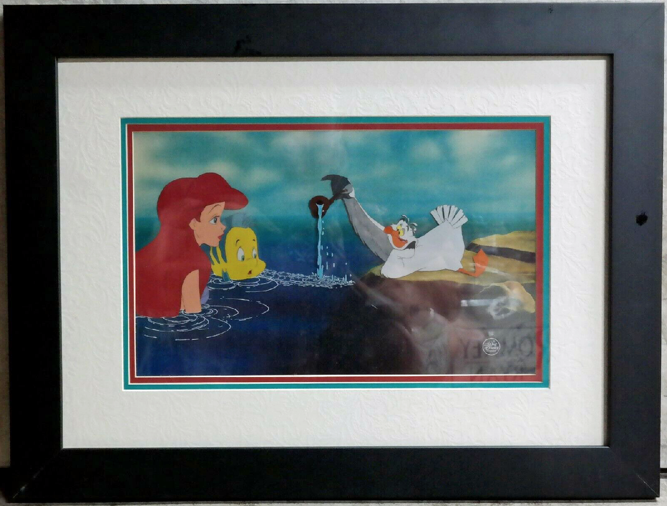 Original Walt Disney Production Cel from The Little Mermaid featuring Ariel, Flounder and Scuttle