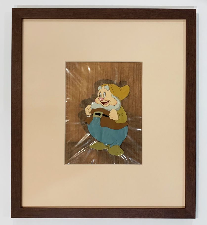 Original Walt Disney Production Cel on Courvoisier Background of Happy from Snow White and the Seven Dwarfs