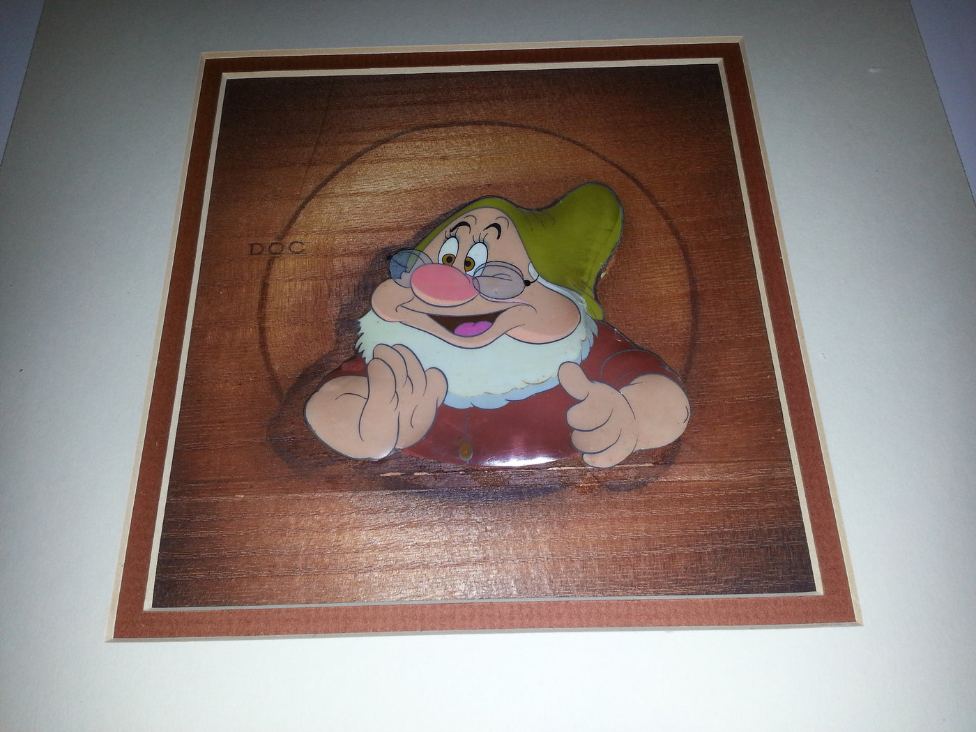 Walt Disney Production Cel on Courvoisier Background Featuring Doc from Snow White and the Seven Dwarfs
